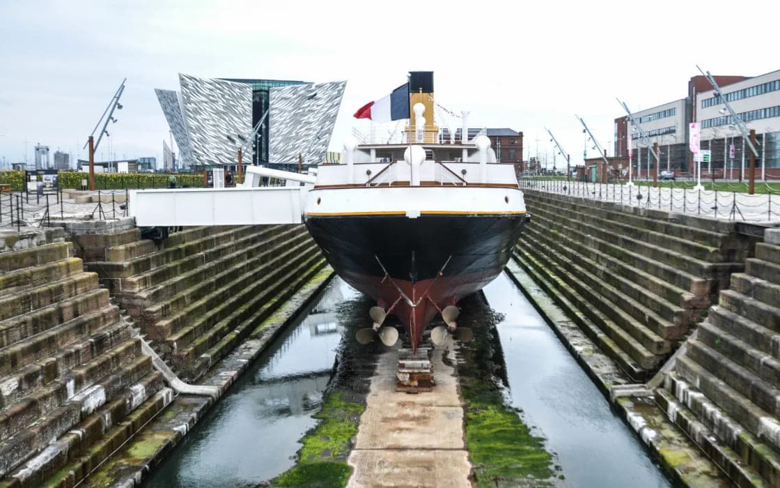 SS Nomadic in dry dock beside Titanic Belfast