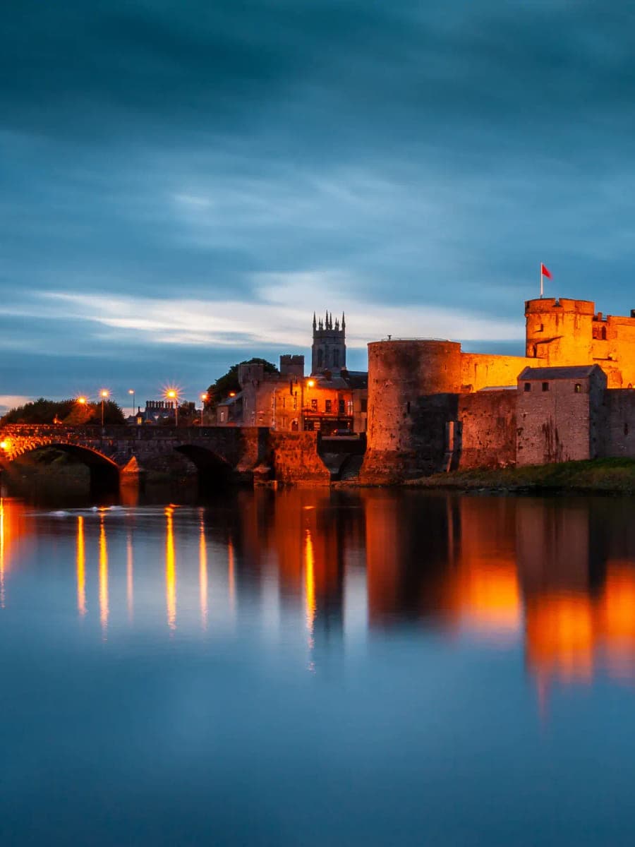 King John's Castle floodlit above the River Shannon in Limerick city